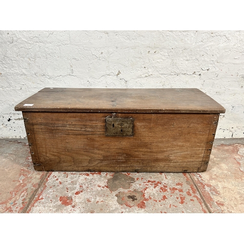 212 - A 17th century carved oak sword chest - approx. 36cm high x 91cm wide x 38cm deep