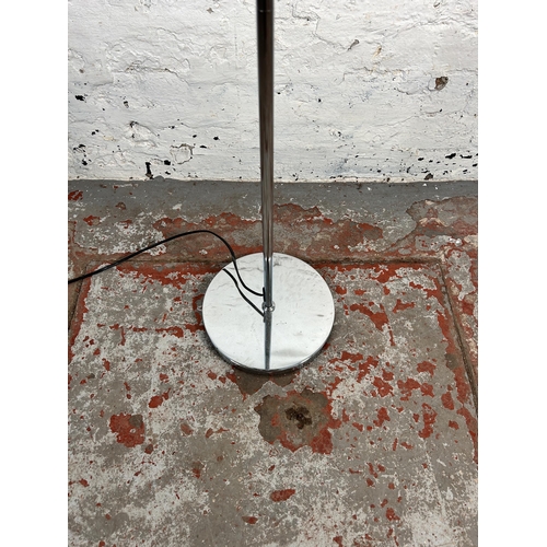 215 - A GoodHome black metal and chrome plated three light floor lamp - approx. 166cm high