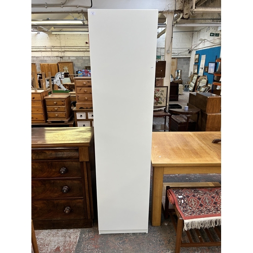 221 - An IKEA Tanem white painted single wardrobe - approx. 201cm high x 50cm wide x 60cm deep