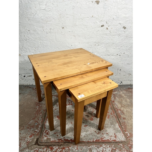 222 - A Next beech nest of tables - approx. 55cm high x 60cm wide x 50cm deep