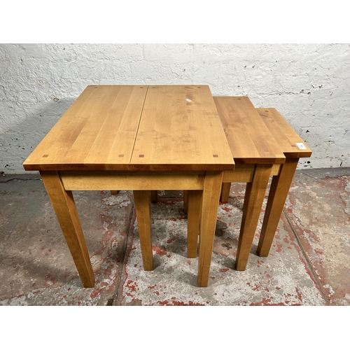 222 - A Next beech nest of tables - approx. 55cm high x 60cm wide x 50cm deep