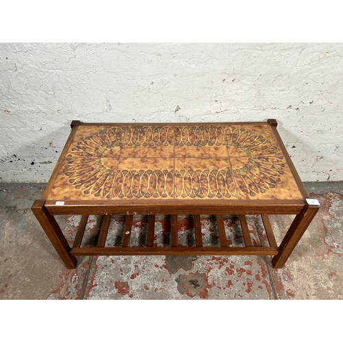 224 - A mid 20th century teak and tile top rectangular coffee table - approx. 41cm high x 47cm wide x 87cm... 