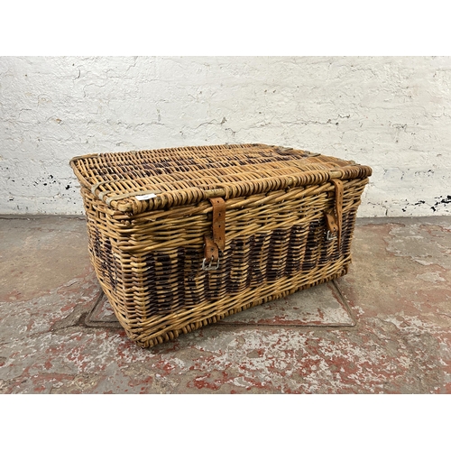 229 - A wicker basket - approx. 38cm high x 77cm wide x 54cm deep