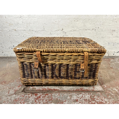 229 - A wicker basket - approx. 38cm high x 77cm wide x 54cm deep