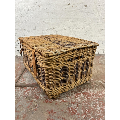 229 - A wicker basket - approx. 38cm high x 77cm wide x 54cm deep