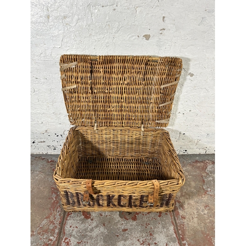 229 - A wicker basket - approx. 38cm high x 77cm wide x 54cm deep