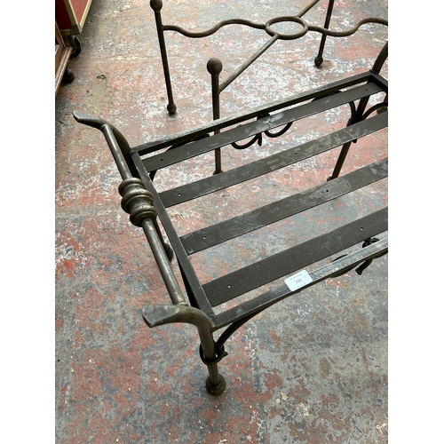 232 - Four blacksmith made wrought iron table bases - largest approx. 43cm high x 53cm wide x 102cm long