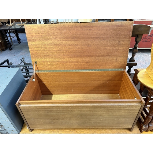 237 - A mid 20th century Avalon teak blanket box - approx. 39cm high x 92cm wide x 43cm deep