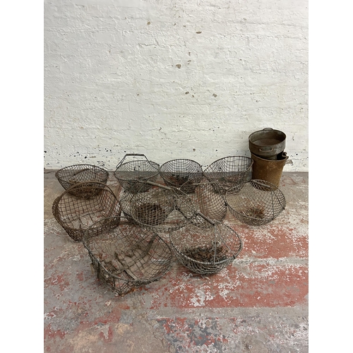 245 - Thirteen items, eleven vintage metal wire potato baskets, one galvanized bucket and one galvanized f... 