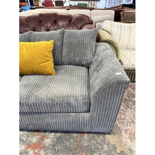 249 - A modern grey fabric upholstered three seater sofa - approx. 190cm wide