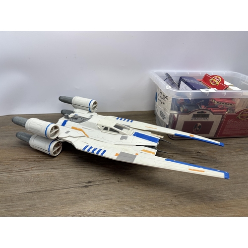 490 - A collection of model vehicles and aircraft to include Hasbro Star Wars aircraft, boxed Corgi millen... 