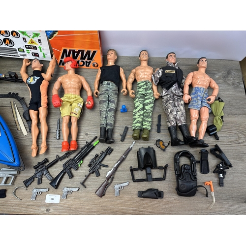 511 - A collection of Action Man figurines and accessories to include Hasbro kayak with instruction manual... 