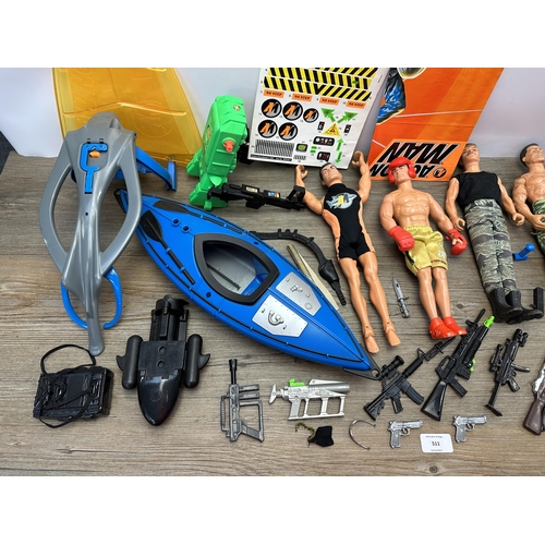 511 - A collection of Action Man figurines and accessories to include Hasbro kayak with instruction manual... 