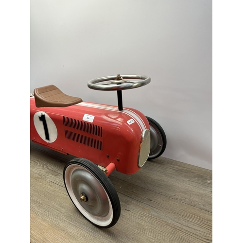 516 - A vintage style child's push along racing car - approx. 75cm long x 37cm high x 35cm wide