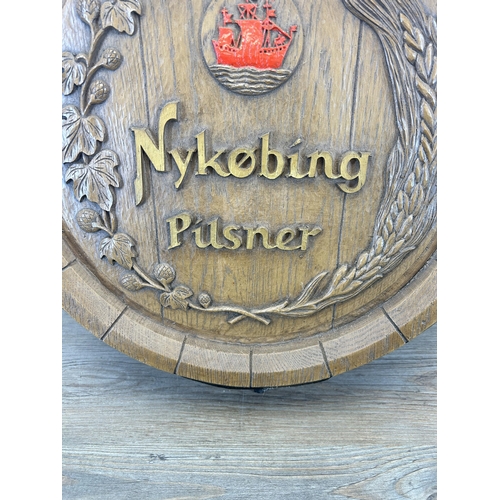 662 - A vintage Nykøbing Pilsner fibre glass barrel shaped advertising wall plaque - approx. 44cm in diame... 