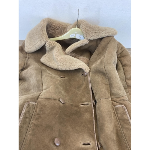 519 - A vintage Morlands sheep skin size 38 double breasted coat