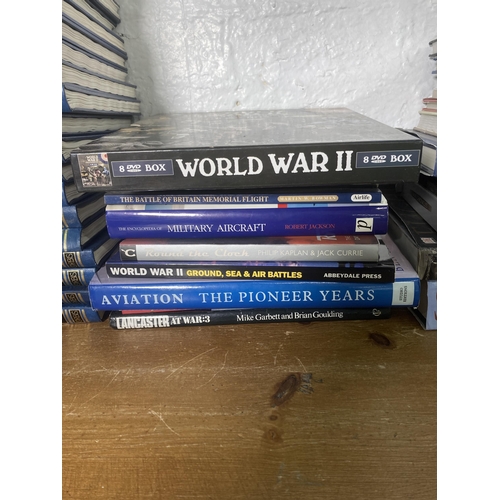 571 - A large collection of aviation and military related books