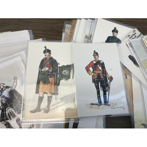 574 - A collection of vintage blank military soldier postcards