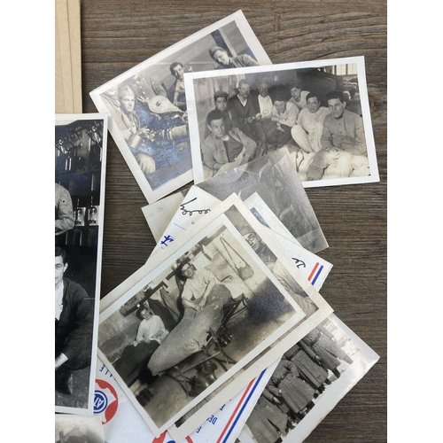 576 - A collection of WWII French prisoners of war ephemera to include handwritten letters, photographs, H... 