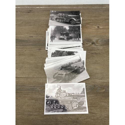 577 - A collection of black and white photographs of WWII German military vehicles