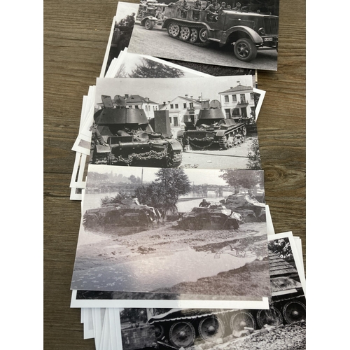 577 - A collection of black and white photographs of WWII German military vehicles