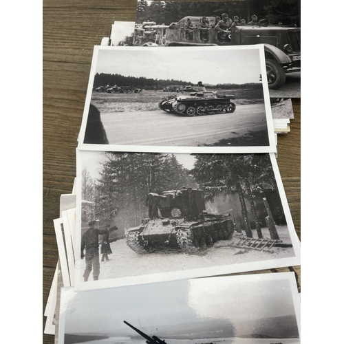 577 - A collection of black and white photographs of WWII German military vehicles