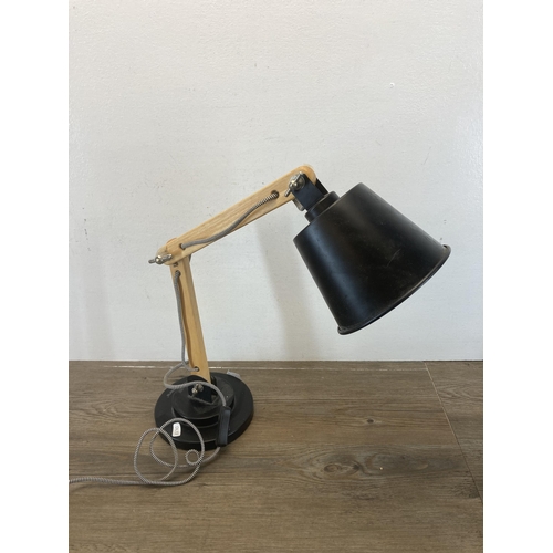 586 - A Tomons industrial style articulated desk lamp