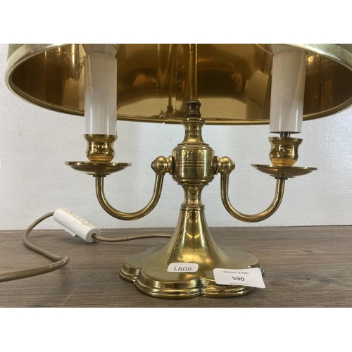 590 - A brass two branch table lamp