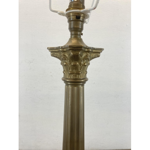 591 - A Laura Ashley brass corinthian column table lamp