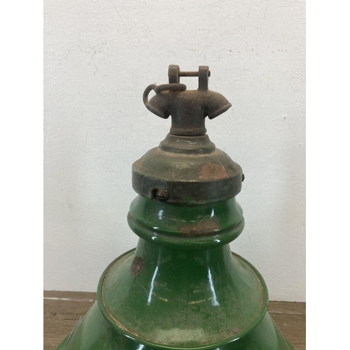 595 - A mid 20th century industrial green enamel pendant down light