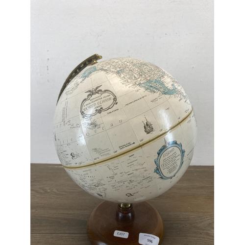 596 - A terrestrial globe on mahogany plinth