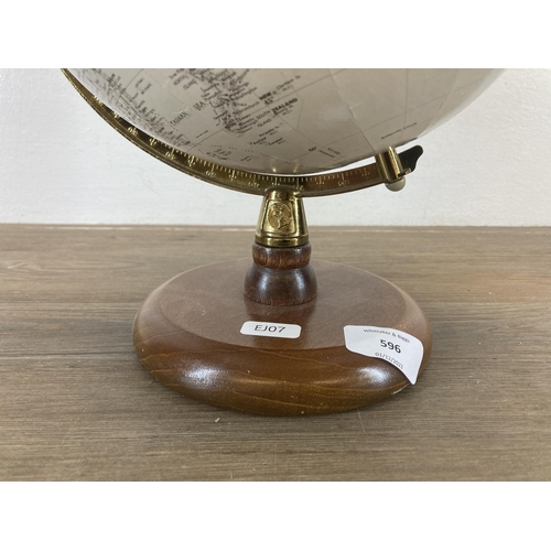 596 - A terrestrial globe on mahogany plinth