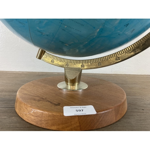 597 - A terrestrial globe on teak plinth