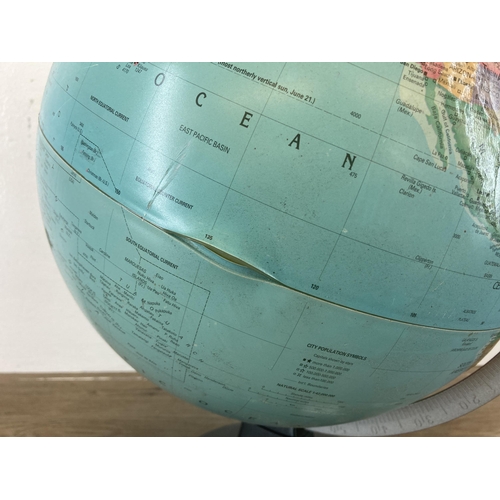 598 - A terrestrial globe on plastic base