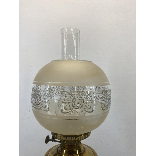 600 - An early 20th century Duplex brass lamp