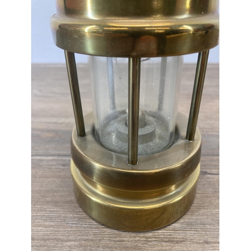 608 - A vintage Welsh brass miner's lamp