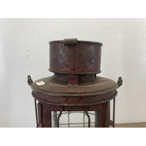 612 - A 1918 Hinks of Birmingham metal paraffin lantern - approx. 32cm high