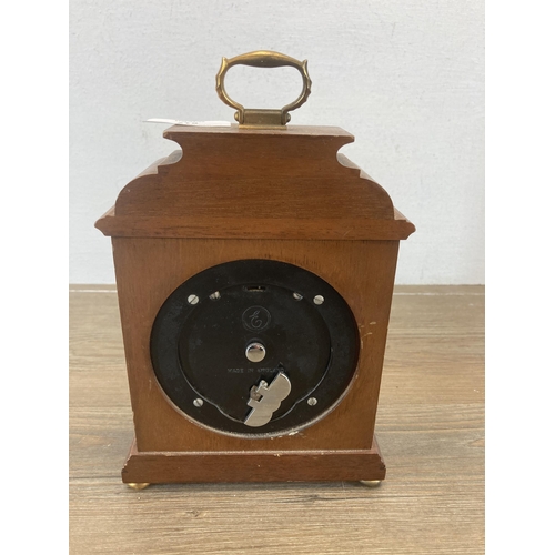 617 - An oak and brass cased Mappin & Webb Ltd. Elliott clock