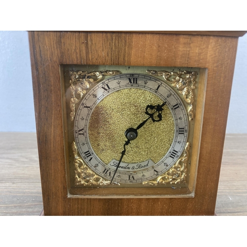 618 - A Thwaites & Reed walnut cased mantel clock with key