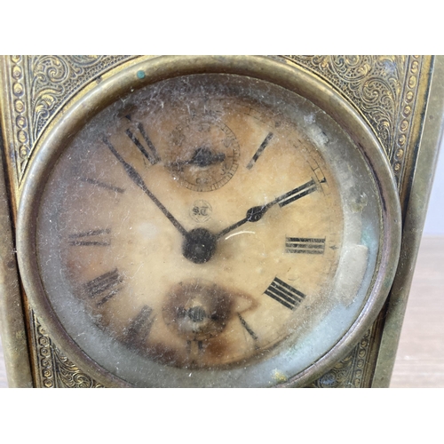 619 - An antique Seth Thomas engraved brass carriage clock