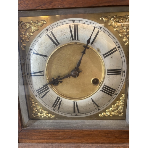 622 - A vintage hardwood cased chiming mantel clock