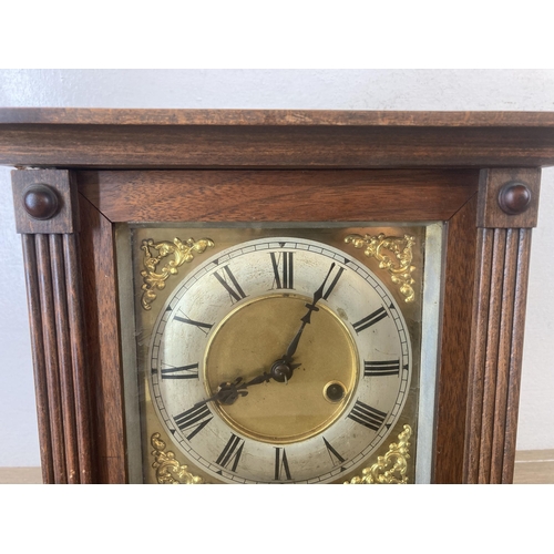 622 - A vintage hardwood cased chiming mantel clock