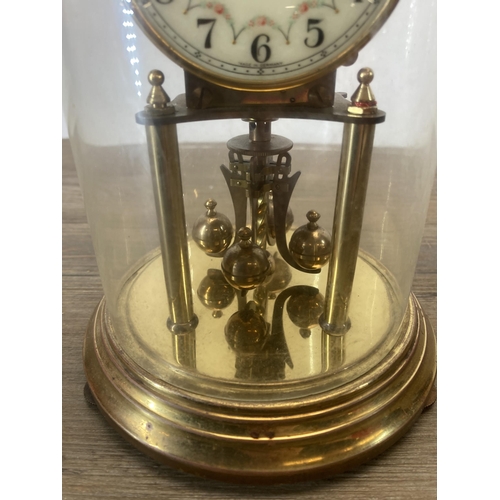 626 - A vintage Kundo brass anniversary clock with enamel dial