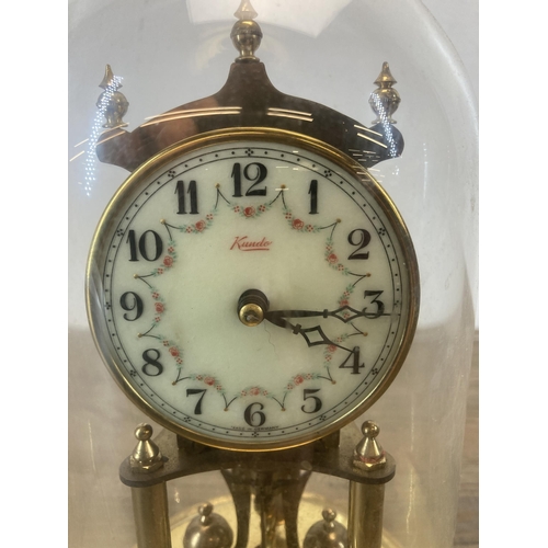 626 - A vintage Kundo brass anniversary clock with enamel dial