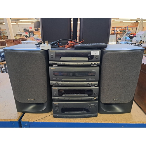 736 - A Technics CH550 hi-fi system comprising CD player, Dolby B/C twin cassette deck, sound processor, t... 