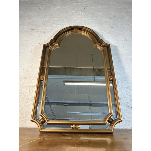 258 - A 19th century style gilt framed arched wall mirror - approx. 109cm high x 67cm wide