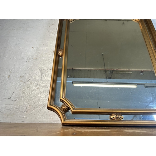 258 - A 19th century style gilt framed arched wall mirror - approx. 109cm high x 67cm wide