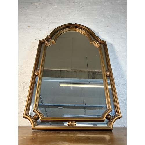 258 - A 19th century style gilt framed arched wall mirror - approx. 109cm high x 67cm wide