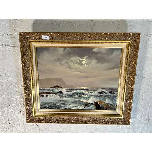 262 - A gilt framed Peter Cosslett (1927 - 2012) oil on canvas of a seascape - approx. 54cm high x 64cm wi... 