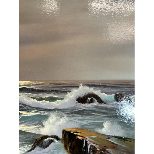 262 - A gilt framed Peter Cosslett (1927 - 2012) oil on canvas of a seascape - approx. 54cm high x 64cm wi... 